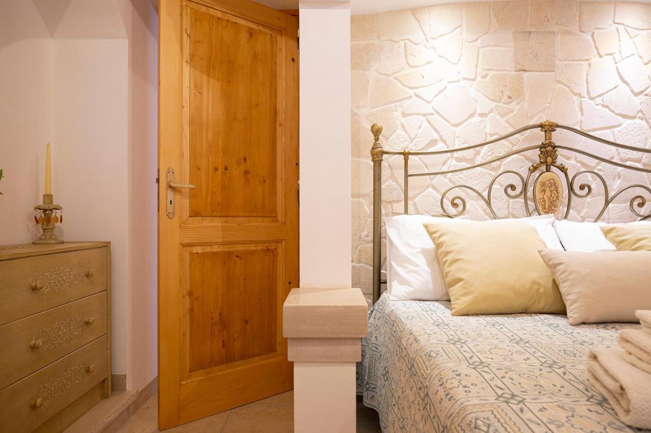 Trullo Arteanima Apartment โลโกโรตอนโด ภายนอก รูปภาพ