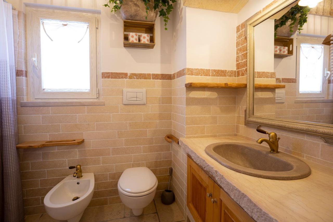Trullo Arteanima Apartment โลโกโรตอนโด ภายนอก รูปภาพ