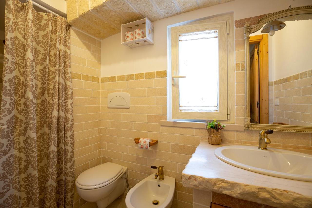 Trullo Arteanima Apartment โลโกโรตอนโด ภายนอก รูปภาพ